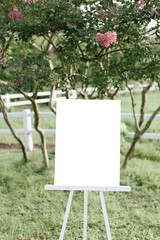 sign mock up white paper board wedding sign outdoor road blank empty easel poster