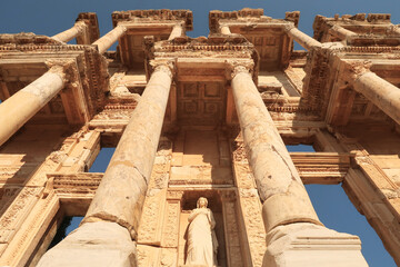 The impressive facade of the Library of Celsus at Ephesus with the statue of Arete, Selcuk, Turkey