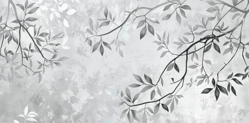 Fototapeta premium A tree branch covered in green leaves stands out against a plain gray background, showcasing the contrast between the natural element and the neutral color.