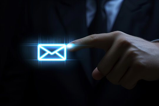 Businessman clicking on email icon, contact by email concept