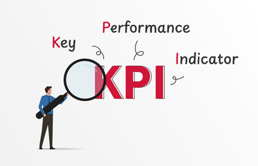 KPI key performance indicator with businessman holds magnifying glass