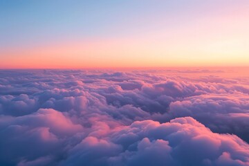 The image shows the sky and clouds as seen from the window of a plane flying at high altitude,...