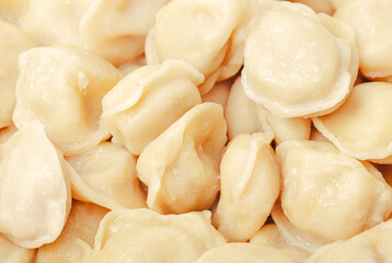 Russian dumplings - dumplings as a background. Close-up.