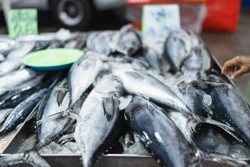 Obraz premium Fresh seafood variety fish sell in traditional asian market