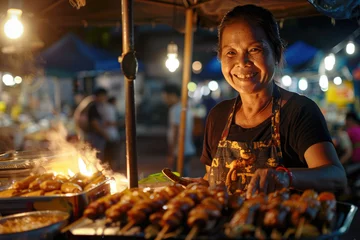 Schilderijen op glas woman smiling selling food at night market © Kien