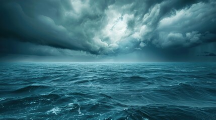 Rainstorm dark clouds and rain drops falling into the ocean sea