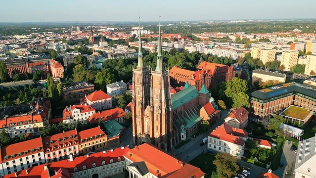 aerial drone video of the Tower of St. Cathedral John the Baptist or Wieża Katedry św. Jana Chrzciciela in Wrocław Poland 
