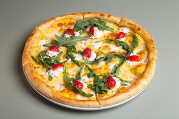 Freshly Baked Pizza with Strawberries, Cream Cheese, and Arugula on White Plate - Summer Party Theme