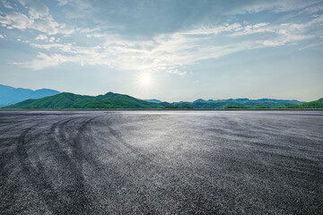 Empty asphalt road and mountains background
