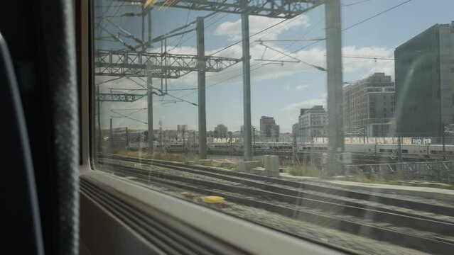 High speed train going through Madrid after departing from Madrid Atocha station