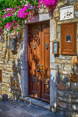 Colorful streets with beautiful houses and curly flowers in Bodrum