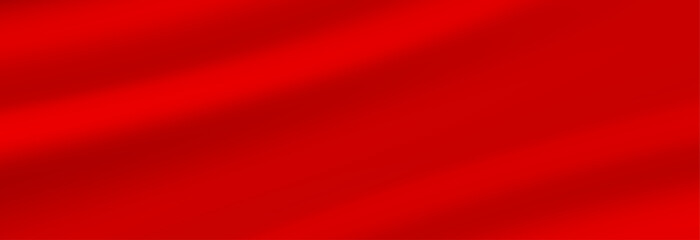 Abstract background, elegant red fabric or liquid waves or folds of satin silk background. Red silk cloth.