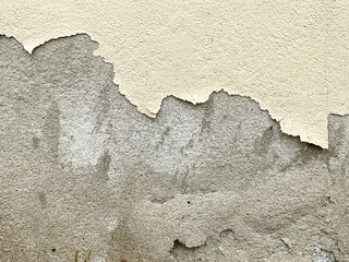 Old cement wall with peeling paint. Abstract background   Old concrete wall with cracks and scratches. Great background or texture and texture for design 
