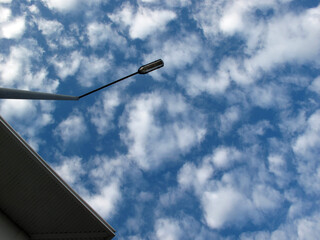 Fototapeta na wymiar Modern building with blue sky and clouds