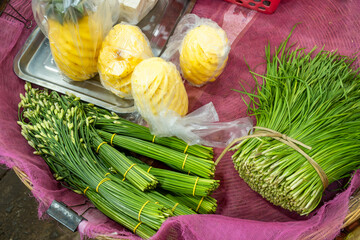 pineapple and spring onions in Siem Reao market