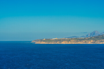Scenic view of the African side of the Strait of Gibraltar featuring the Cap Malabata in Tanger,...