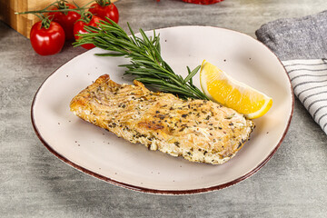 Baked salmon fish served rosemary