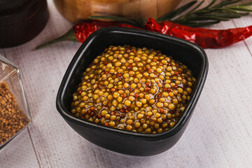 Spicy mustard sauce with seeds