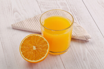 Sweet fresh orange juice in the glass