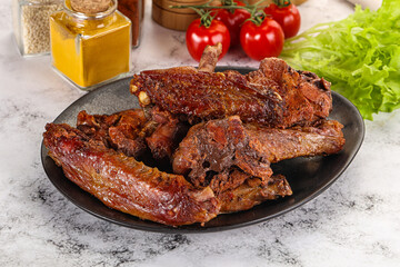 Roasted duck wings with sauce