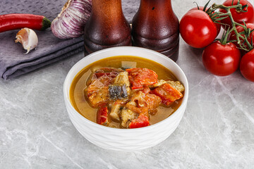 Traditional yellow Thai curry with chicken