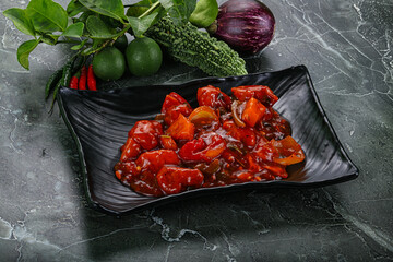 Chinese cuisine - chicken in sweet and sour sauce