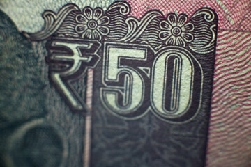 The close of view of Old 50 rupees indian currency note.