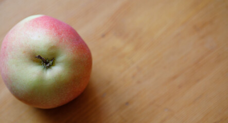 Fresh apple on wooden surface