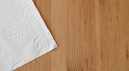 White paper napkin on wooden surface