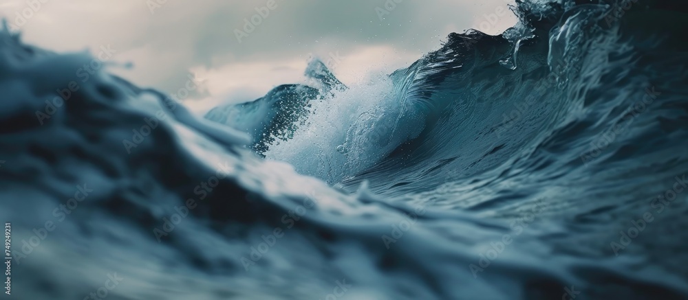 Poster a large, powerful wave rises in the middle of the ocean, showcasing the raw force of nature. the wav