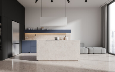 Elegant home interior with cooking and relaxing space with couch and window