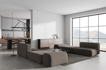 Stylish flat studio interior with luxury furniture and window. Mock up wall