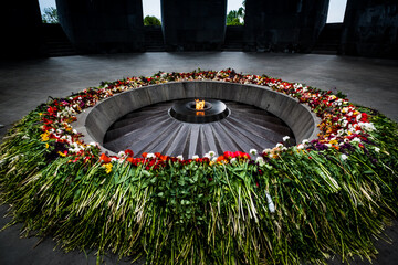 Eternal flame in the Tsitsernakaberd memorial monument of the Armenian Genocide. Yerevan, Armenia,...