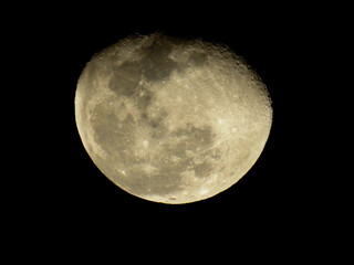 a full moon with a black background in the night sky