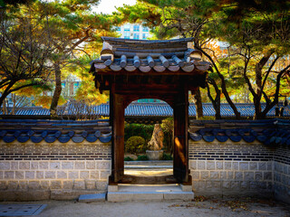 Gate and entrance to traditional Korean house at the folk village park in Seoul, South Korea