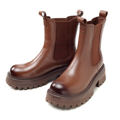 Women leather brown boots on white background
