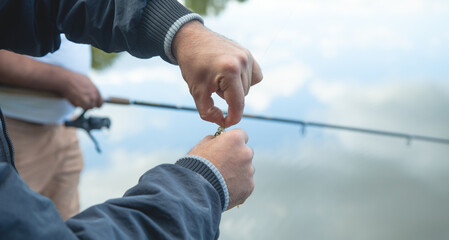 Man prepare lure to catch fish.