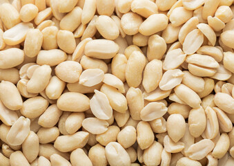 Healthy blanched peanut nuts top view macro background.Top view.