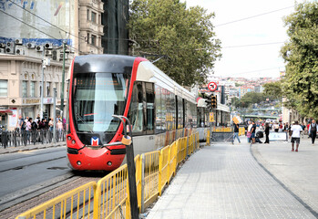 Istanbul old historical town Turkish ancient architecture street tram people cobblestone road - obrazy, fototapety, plakaty