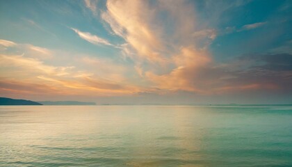 A background that exudes a sense of tranquility, like a soft pastel sunset with wispy clouds