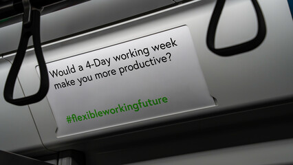Would a 4-Day working week make you more productive on a sign on a commuter train	
