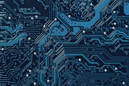 An electronic circuit board pattern with ICs and chipsets arranged in a beautiful order. Electronics illustrations