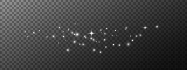 Golden sparks and stars glitter with a special light effect. Vector sparkles on a transparent background create a Christmas abstract. Vector sparkles on a transparent background create a Christmas abs