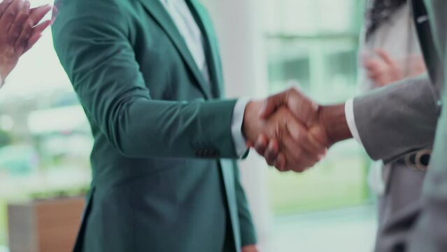Business people shake hands