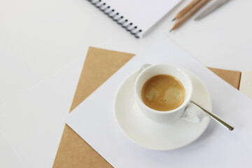 Workspace Flatlay with Cup of Espresso Coffee, Notebooks, Papers, Pencils and Pen. Work, Business Concept.