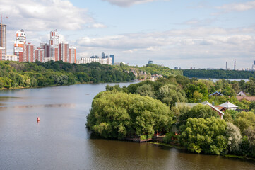 A picturesque view from the bridge over the Moscow River to the river floodplain.