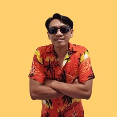 Fototapeta premium Young Asian man wearing summer clothes laughing and having fun.