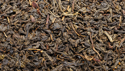 Chinese Pu Ehr dried tea leaves close up full frame as background