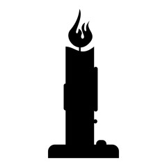 burning candle in a candlestick