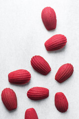 Top view of Red velvet madeleines on a marble tray, red madeleines cake or cookies for bakery